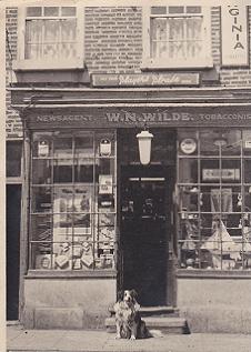 Now Martins newsagents in Stokesley High Street. The shop front in this photograph is now used in the street in the York Castle Museum. This photograph has been contributed by Don and Peggy Simmonds, who ran the newsagents until 1976. The dog was called Shep!