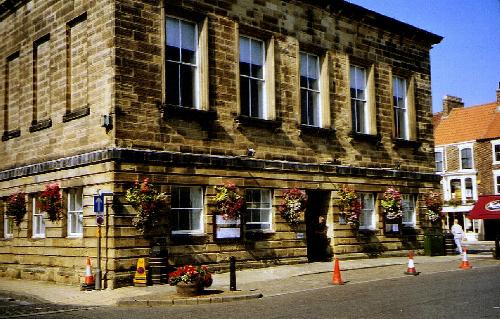 The Town Hall is enhanced by the baskets