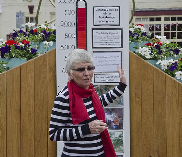 Linda explaining how the money was raised