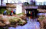 The grotspot where cans, bottles, and lunch boxes are dumped over the bridge